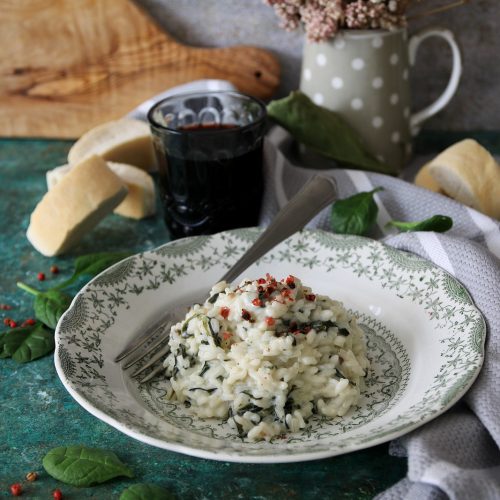 risotto agli spinacini con caprino e pepe rosa